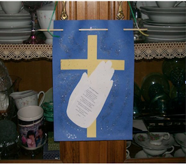 Lords prayer cross on blue background