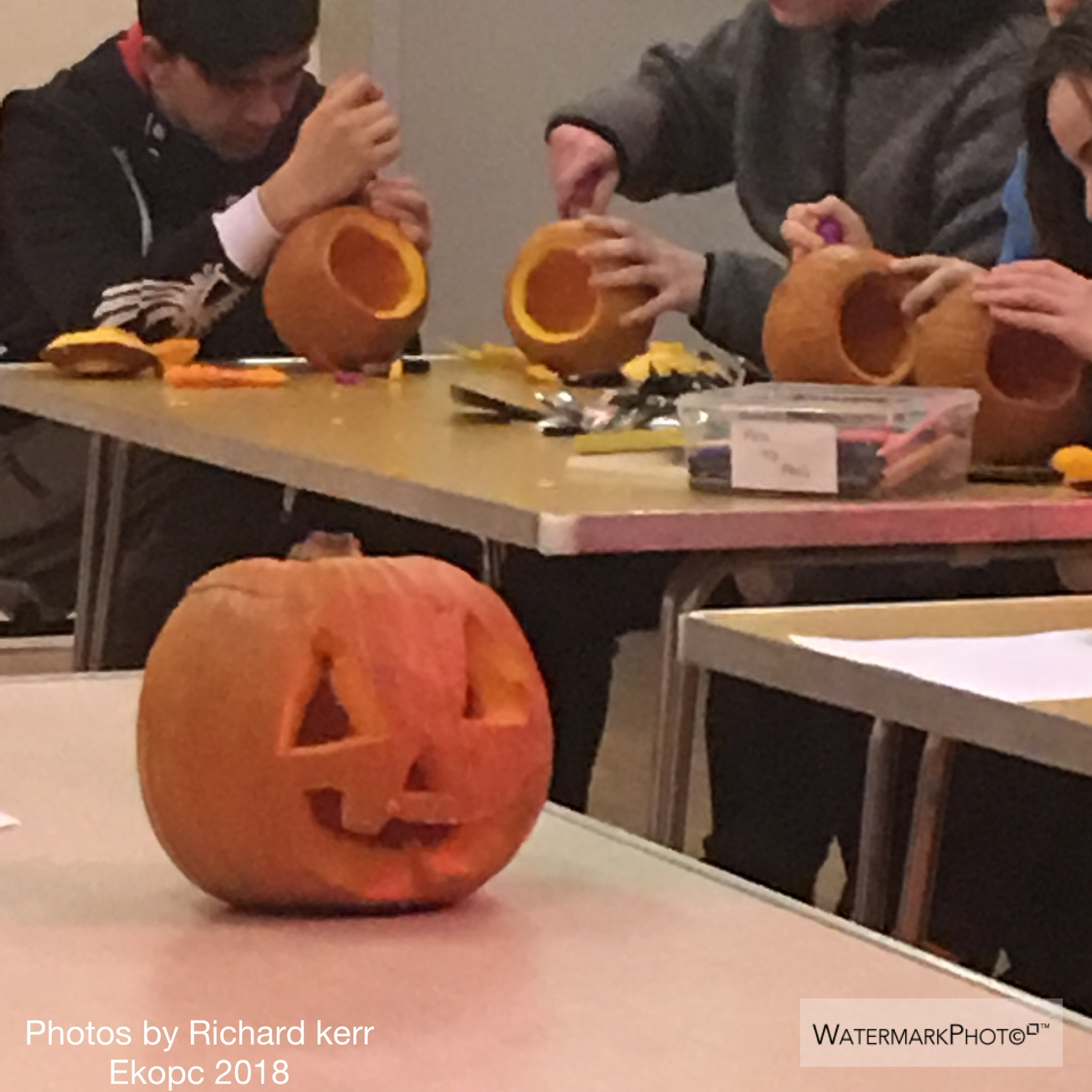 Youth members carving pumpkins good copy