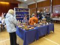 woodwork plus table and other stall in back 